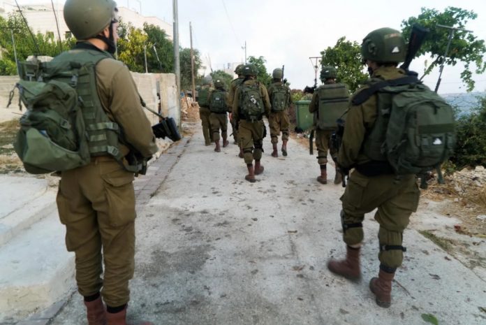 Izraeli katonák Beit Kahil palesztin faluban, Ciszjordániában, 2019 - fotó: Izraeli Hadsereg